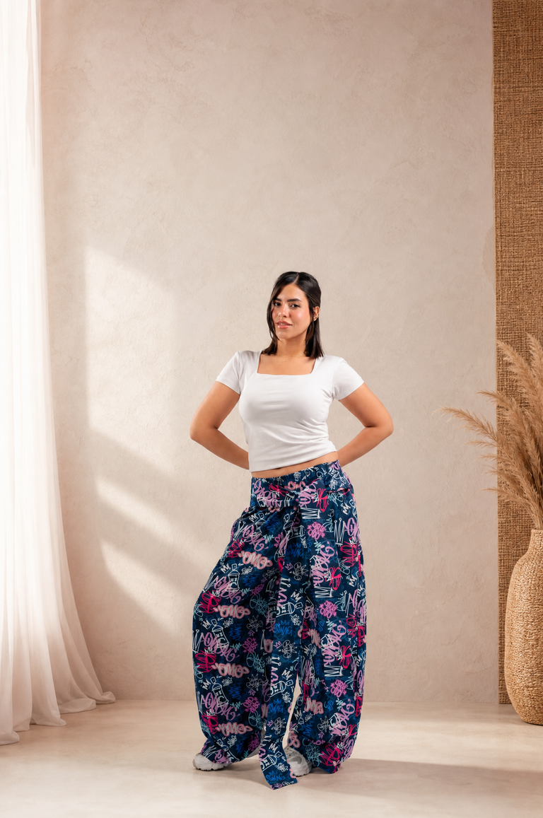Didi hero - graffiti pants on textured backdrop (desktop)