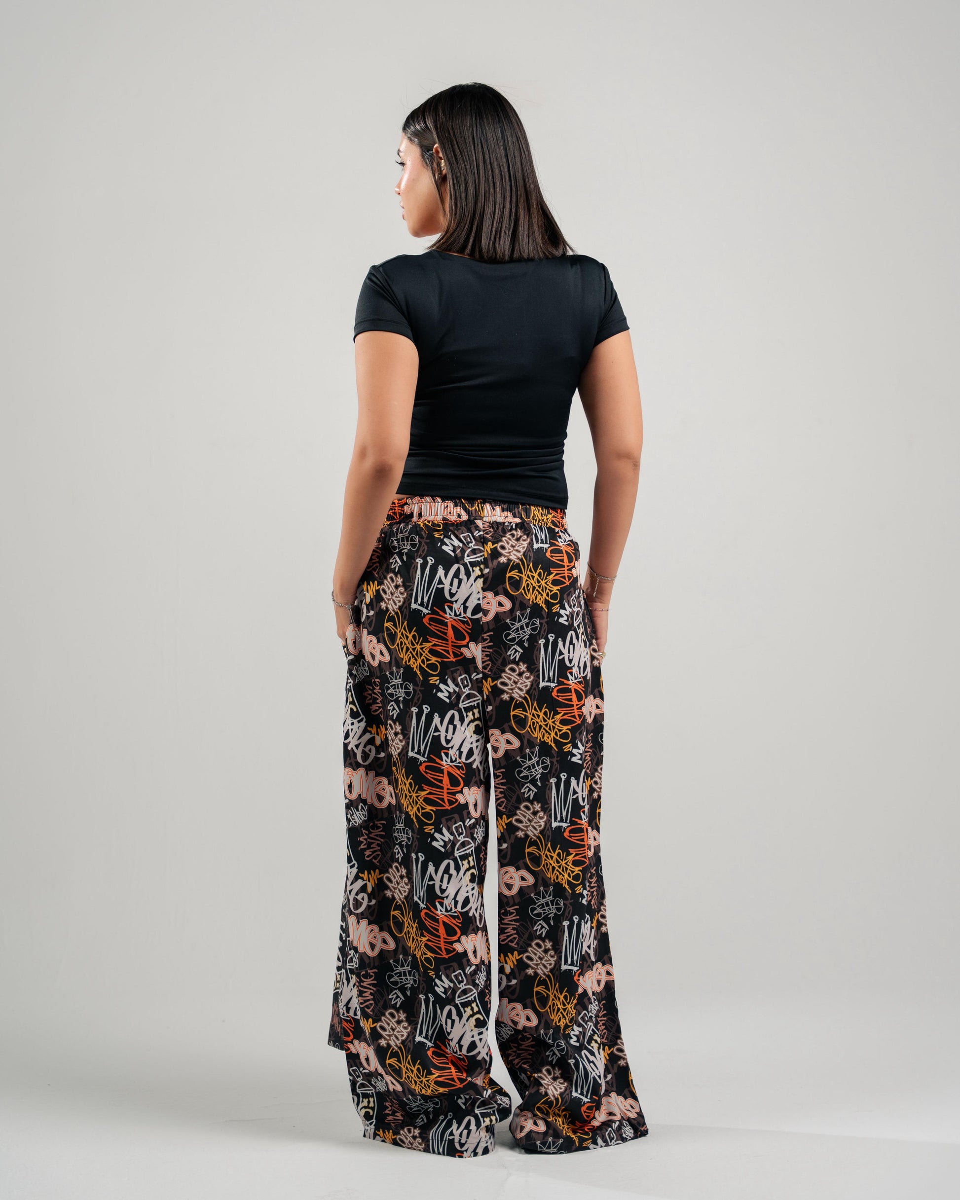 Graffiti Print Wide-Leg Pants in Black - back view